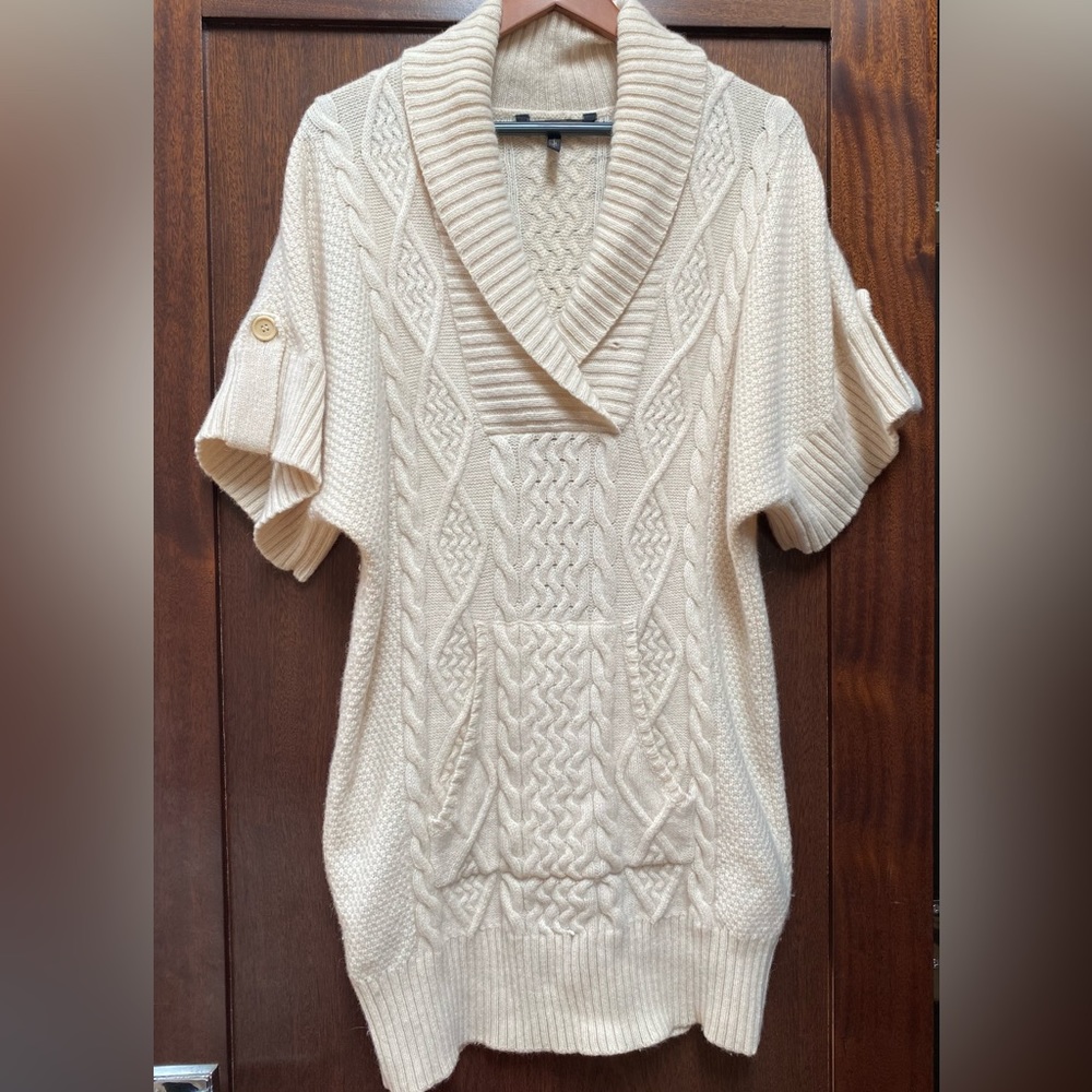 Ivory long shawl collar wool sweater.